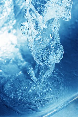 simsearch:622-07519538,k - close up view of blue, splashing water Stock Photo - Budget Royalty-Free & Subscription, Code: 400-03947840