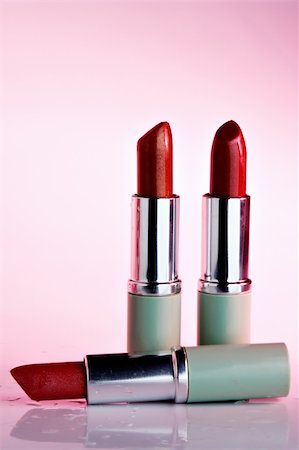 simsearch:649-07520416,k - Three lipsticks with pink cast Stock Photo - Budget Royalty-Free & Subscription, Code: 400-03949113