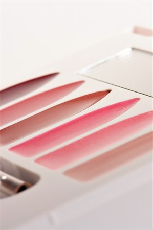 simsearch:400-05708035,k - Lipstick set closeup on white Stock Photo - Budget Royalty-Free & Subscription, Code: 400-03949392