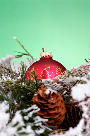 simsearch:632-06118429,k - Red ornament in nest and snow Stock Photo - Budget Royalty-Free & Subscription, Code: 400-03949509