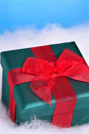 simsearch:622-06190925,k - Christmas present on show and blue background Stock Photo - Budget Royalty-Free & Subscription, Code: 400-03949501