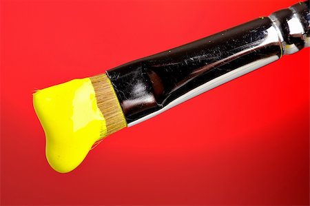 simsearch:400-04477939,k - Yellow paint dripping from brush Stock Photo - Budget Royalty-Free & Subscription, Code: 400-03949570