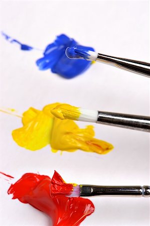 simsearch:644-01630853,k - Three brushes holding primary colors Stock Photo - Budget Royalty-Free & Subscription, Code: 400-03949600