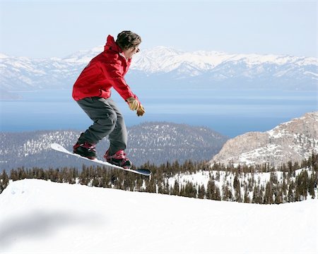 simsearch:400-03985663,k - Snowboarder jumping with a beautiful view Stock Photo - Budget Royalty-Free & Subscription, Code: 400-03940465