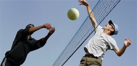 simsearch:632-01155154,k - 2 men playing volleyball Stock Photo - Budget Royalty-Free & Subscription, Code: 400-03940799