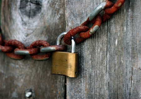 simsearch:600-03445182,k - A lock and a rusty chain Stock Photo - Budget Royalty-Free & Subscription, Code: 400-03941324