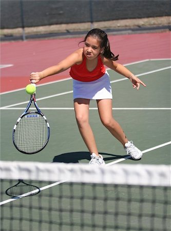 simsearch:640-06050635,k - Girl playing tennis Stock Photo - Budget Royalty-Free & Subscription, Code: 400-03941890