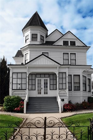 simsearch:700-03508131,k - Beautiful Victorian white house with a lawn in front Stock Photo - Budget Royalty-Free & Subscription, Code: 400-03942078