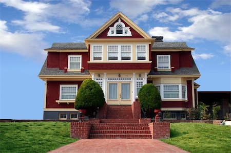 simsearch:700-03508131,k - Beautiful red house with a lawn in front Stock Photo - Budget Royalty-Free & Subscription, Code: 400-03942511