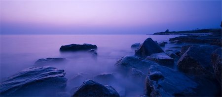 simsearch:400-04581013,k - Fantastic scene of coast rocks in sea waves at sunset Stock Photo - Budget Royalty-Free & Subscription, Code: 400-03942732