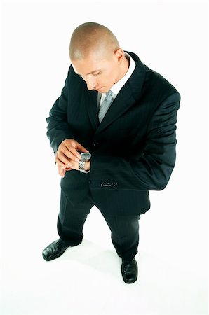 simsearch:400-03954954,k - A young businessman with a blue tie and white shirt with hand watch Stock Photo - Budget Royalty-Free & Subscription, Code: 400-03954924