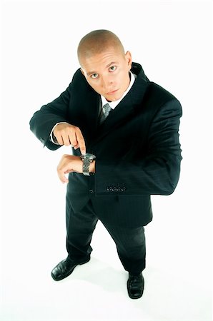 simsearch:400-03954954,k - A young businessman with a blue tie and white shirt with hand watch Stock Photo - Budget Royalty-Free & Subscription, Code: 400-03954926
