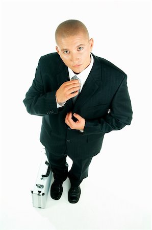 simsearch:400-03954954,k - A young businessman with a blue tie and white shirt with case Stock Photo - Budget Royalty-Free & Subscription, Code: 400-03954933