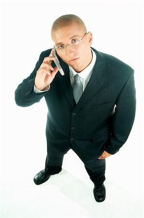simsearch:400-03954954,k - A young businessman with a blue tie and white shirt with cell phone Stock Photo - Budget Royalty-Free & Subscription, Code: 400-03954941