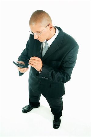 simsearch:400-03954954,k - A young businessman with a blue tie and white shirt with PDA Stock Photo - Budget Royalty-Free & Subscription, Code: 400-03954943
