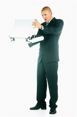 simsearch:400-03954954,k - A Young businessman with case Stock Photo - Budget Royalty-Free & Subscription, Code: 400-03954962