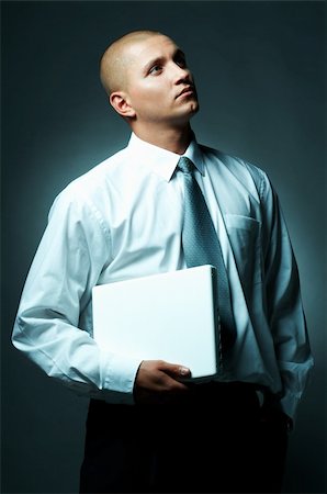 simsearch:400-03954954,k - A Young businessman with laptop computer Stock Photo - Budget Royalty-Free & Subscription, Code: 400-03954974