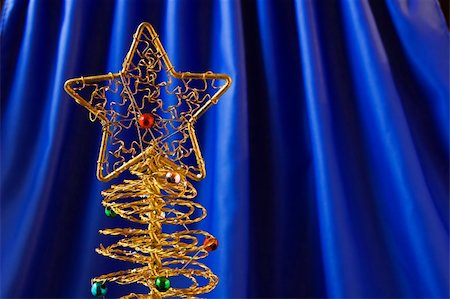 simsearch:400-04499144,k - Metallic christmas tree on blue background Stock Photo - Budget Royalty-Free & Subscription, Code: 400-03955056