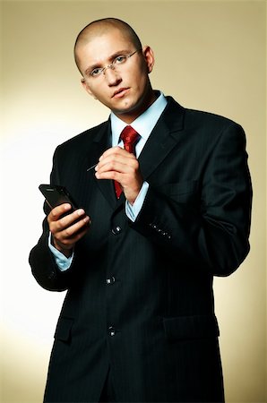 simsearch:400-03954954,k - A businessman using PDA computer Stock Photo - Budget Royalty-Free & Subscription, Code: 400-03955080