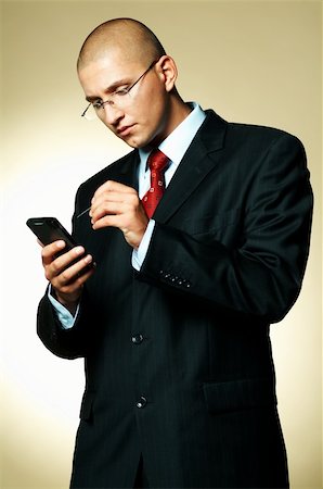 simsearch:400-03954954,k - A businessman using PDA computer Stock Photo - Budget Royalty-Free & Subscription, Code: 400-03955082