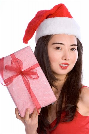simsearch:622-06190925,k - Girl in Santa's hat Stock Photo - Budget Royalty-Free & Subscription, Code: 400-03956487