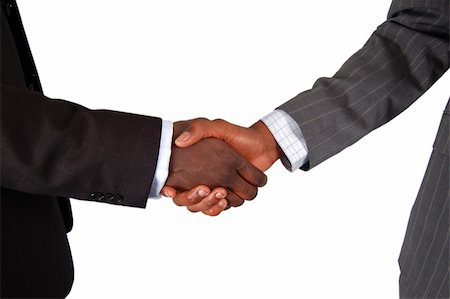 simsearch:400-04434336,k - This is an image of two male bodies, representing businessmen in handshake of agreement. Stock Photo - Budget Royalty-Free & Subscription, Code: 400-03956944