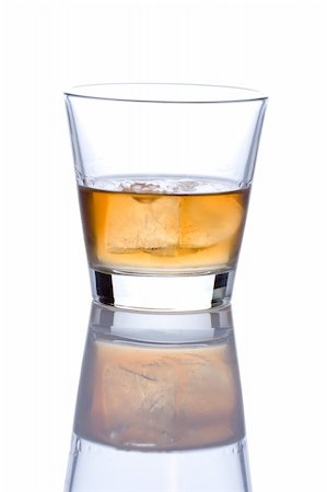 simsearch:400-04558755,k - Glass of alcohol shot against white background Stock Photo - Budget Royalty-Free & Subscription, Code: 400-03957102