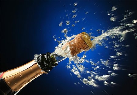 simsearch:825-05985931,k - Champagne splash. Bottle and cork, celebration time Stock Photo - Budget Royalty-Free & Subscription, Code: 400-03957643