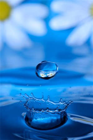 simsearch:622-07519538,k - waterdrop splashing into another watersplash Stock Photo - Budget Royalty-Free & Subscription, Code: 400-03957796