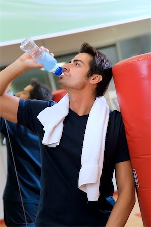 simsearch:400-05115517,k - health club: athlete relaxing and drinking some water Stock Photo - Budget Royalty-Free & Subscription, Code: 400-03959838
