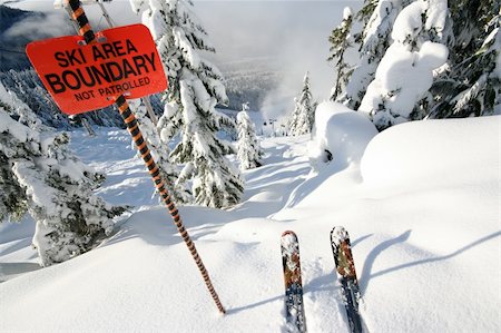 extreme skiing cliff - A sign warns of danger ahead, but how can one resist such temptation? Stock Photo - Budget Royalty-Free & Subscription, Code: 400-03950103