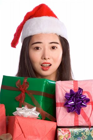 simsearch:622-06190925,k - Excited Asian girl with pile of Christmas gifts Stock Photo - Budget Royalty-Free & Subscription, Code: 400-03950115