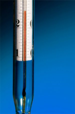 simsearch:600-06702130,k - The thermometer on a dark blue background Stock Photo - Budget Royalty-Free & Subscription, Code: 400-03950140