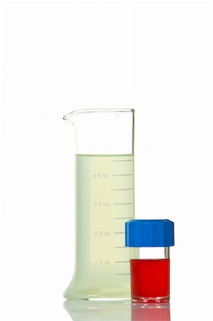 simsearch:649-07279795,k - A test flasks with blue and red liquid, reflected on white background Stock Photo - Budget Royalty-Free & Subscription, Code: 400-03951073