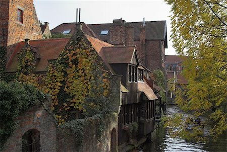 Ancient houses on a channel in Brugge (Bruges), Belgium Stock Photo - Budget Royalty-Free & Subscription, Code: 400-03953670