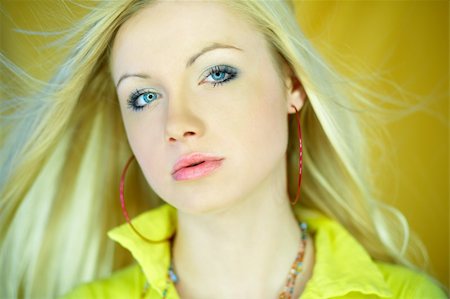 simsearch:614-03191133,k - Portrait of beautiful blond woman wearing yellow shirt Stock Photo - Budget Royalty-Free & Subscription, Code: 400-03964990