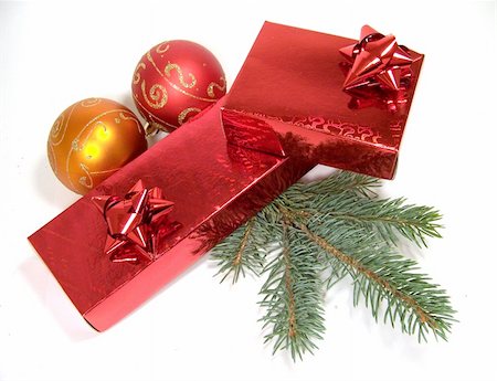 simsearch:633-02418107,k - Two red gift boxes with fir-tree branch and two decorative balls Stock Photo - Budget Royalty-Free & Subscription, Code: 400-03965194