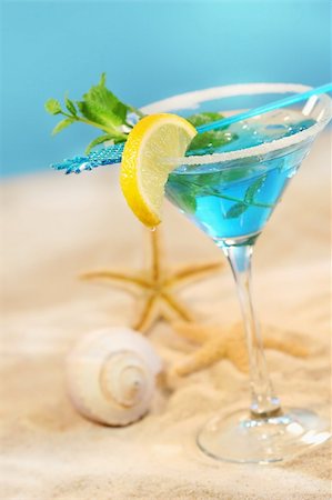 simsearch:400-03965729,k - Blue tropical summer drink in the sand Stock Photo - Budget Royalty-Free & Subscription, Code: 400-03965729