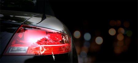 Black car in traffic at night Photographie de stock - Aubaine LD & Abonnement, Code: 400-03966415