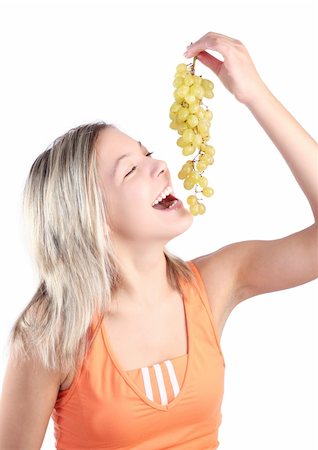 simsearch:614-03191133,k - Beautiful young smiling girl with grapes, isolated on white background Stock Photo - Budget Royalty-Free & Subscription, Code: 400-03966794