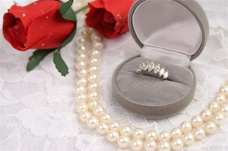 simsearch:694-03783247,k - a diamond ring, string of pearls and roses on a lace background Stock Photo - Budget Royalty-Free & Subscription, Code: 400-03967391