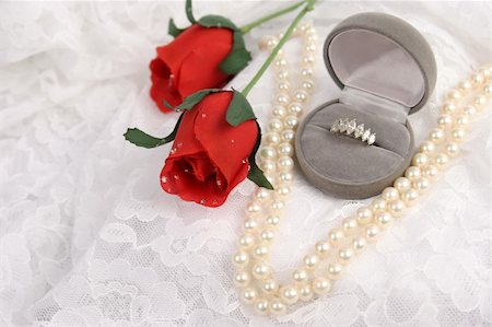 simsearch:694-03783247,k - a diamond ring, string of pearls, and silk roses on lace - room for text Stock Photo - Budget Royalty-Free & Subscription, Code: 400-03967393