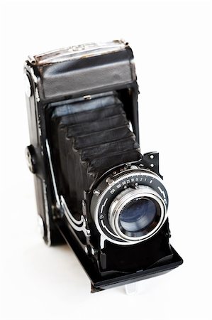 simsearch:400-03909049,k - Old camera isolated Photographie de stock - Aubaine LD & Abonnement, Code: 400-03967677