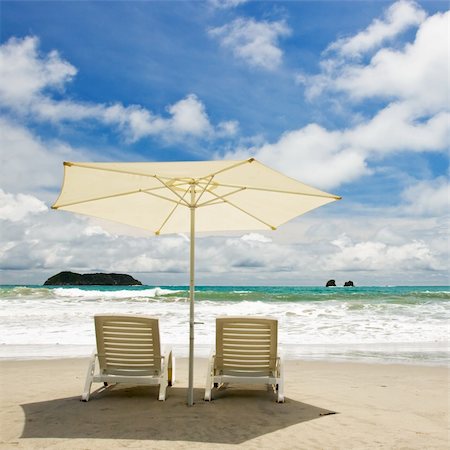 simsearch:400-04062726,k - Two chairs and umbrella at the beach. Manuel Antonio, Costa Rica. Foto de stock - Super Valor sin royalties y Suscripción, Código: 400-03968268