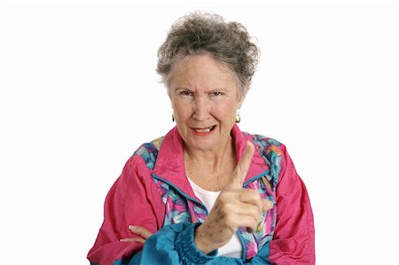 simsearch:400-07221782,k - A retired senior woman in a track suit shaking her finger angrily.  Isolated on white. Stock Photo - Budget Royalty-Free & Subscription, Code: 400-03969114