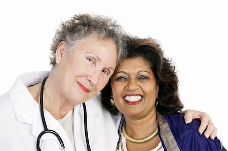 Closeup of a female doctor and patient showing their closeness and bond of trust.  Isolated on white. Stock Photo - Budget Royalty-Free & Subscription, Code: 400-03969166