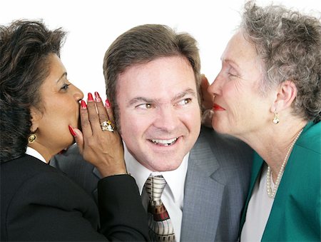 Closeup of a man listening to gossip from two female coworkers.  Isolated on white. Stock Photo - Budget Royalty-Free & Subscription, Code: 400-03969238