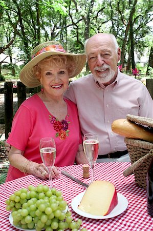 simsearch:400-04208630,k - An attractive senior couple enjoying a picnic outdoors. Stock Photo - Budget Royalty-Free & Subscription, Code: 400-03969420
