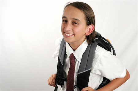simsearch:614-06116419,k - a cute school boy in his uniform, with a back pack - room for text Stock Photo - Budget Royalty-Free & Subscription, Code: 400-03969746