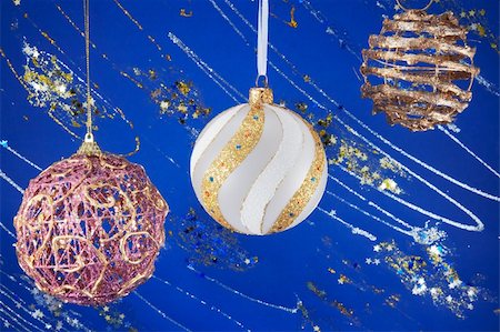 simsearch:614-02241057,k - Festive Christmas hanging balls composition on blue decorative winter background with sparkles and stars Stock Photo - Budget Royalty-Free & Subscription, Code: 400-03969982